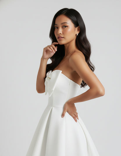 Women's White Mini Playsuit with Strapless Neckline and Bow Detail